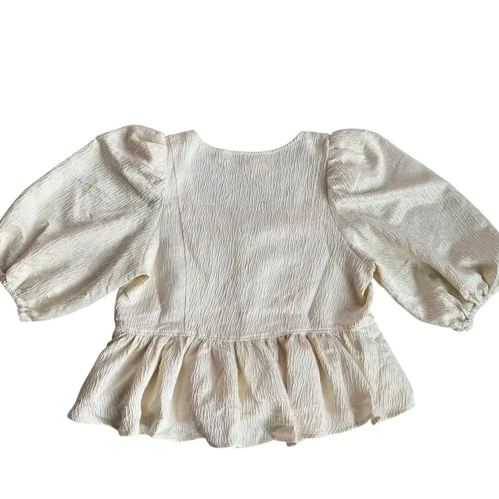 Free People NWT Cream Peplum Blouse Women's XL Textured Puff Sleeve Bow Top